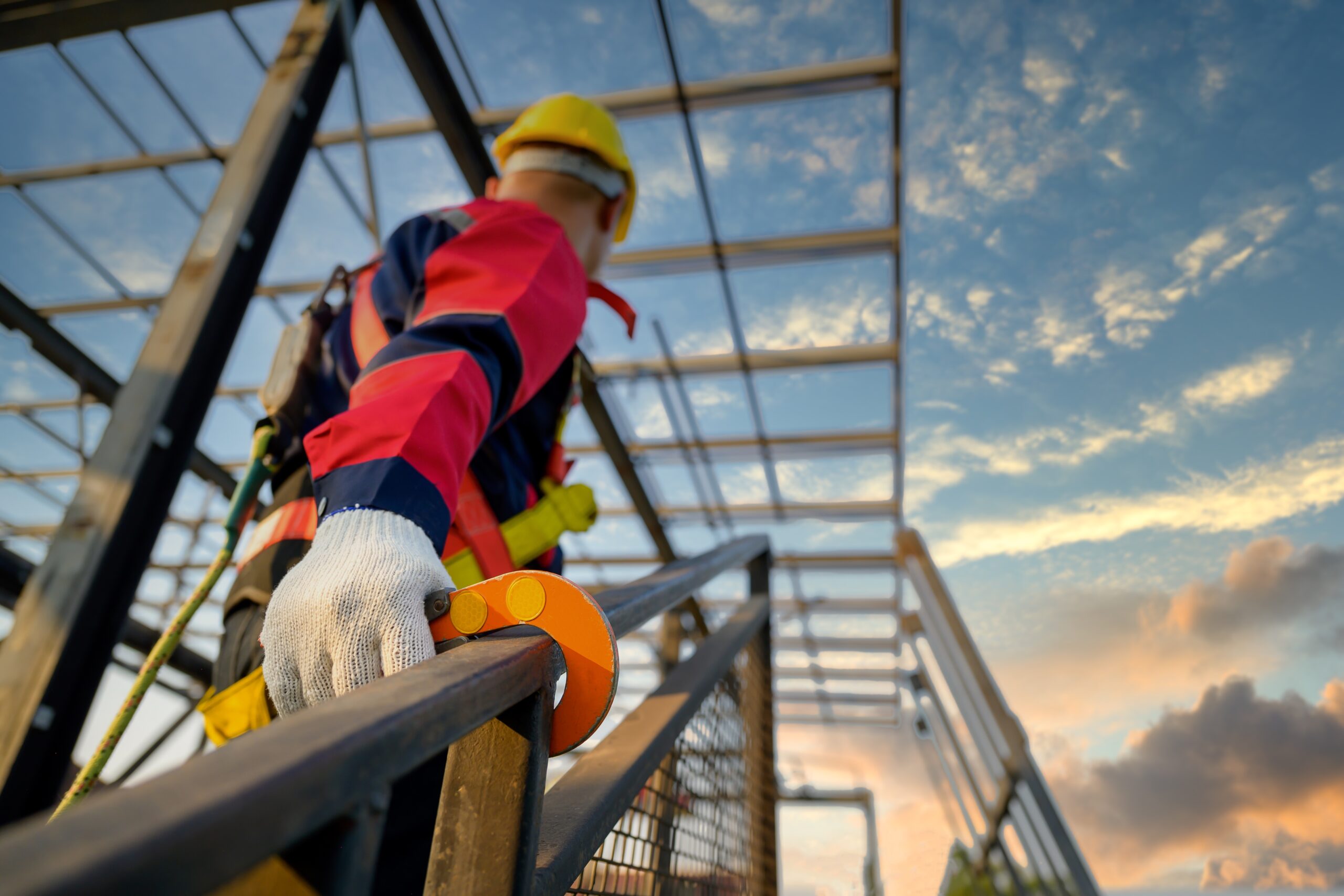 Asian,Male,Construction,Worker,Working,At,Height,On,Steel,Frame